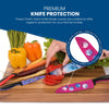 Experience the vibrant Cosmos Series Knife Set by Chef's Vision, complete with colorful chef's knives and vegetables arranged on a cutting board. The eye-catching BladeKeepers Blade Covers provide outstanding protection, adorned with gem-like decorations in shades of pink and purple.