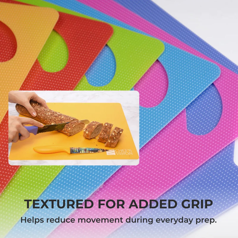 Six color-coded, textured SliceBright Flexible Cutting Mats by Chef’s Vision in assorted colors, with an inset image showing bread being sliced on the yellow mat. Text: "TEXTURED FOR ADDED GRIP. Helps reduce movement during everyday prep." These flexible cutting mats are also dishwasher safe for easy cleanup.