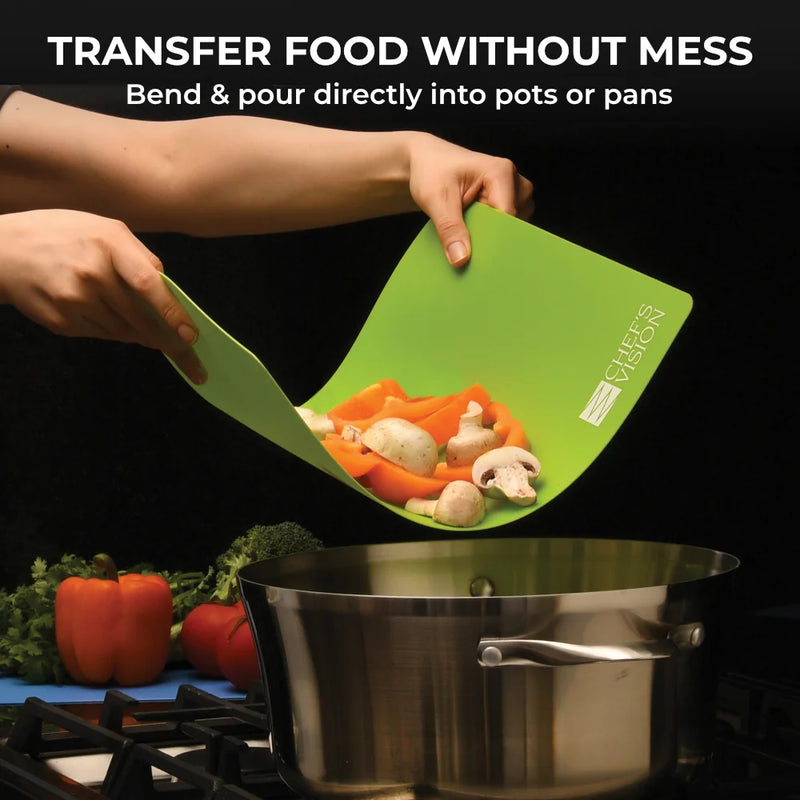 A person bends a green Slice Bright Flexible Cutting Mat by Chef's Vision to pour chopped veggies into a pot. Text: "Transfer food without mess." Use BPA-free, color-coded Chef's Vision mats—set of 6—for safe, organized meal prep.