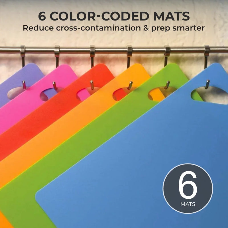 The Slice Bright Flexible Cutting Mats by Chef's Vision come in a set of 6 colorful, BPA-free mats—blue, orange, pink, red, purple, and green—with a corner hole and the "Chef's Vision" logo printed on the green mat.