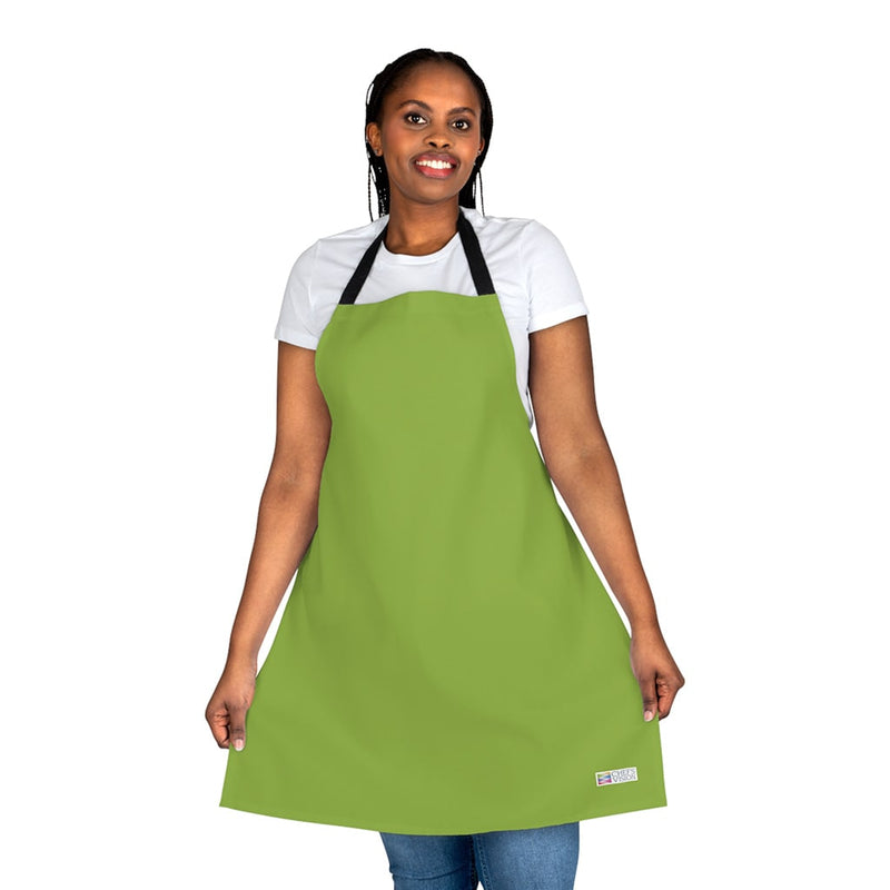 A woman wearing a Chef's Vision apron.