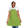 A vibrant woman showcasing her Chef's Vision green apron from her Color Apron collection.