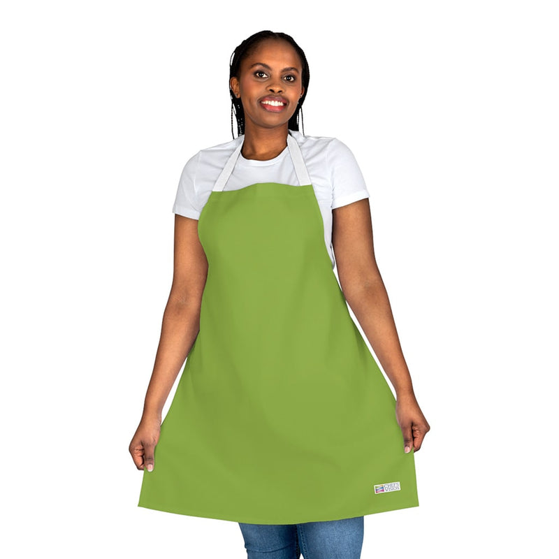 A woman wearing a Chef's Vision apron.