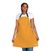 A woman wearing a Chef's Vision apron.