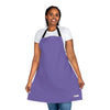 A vibrant woman showcasing a Chef's Vision Color Apron from her collection.
