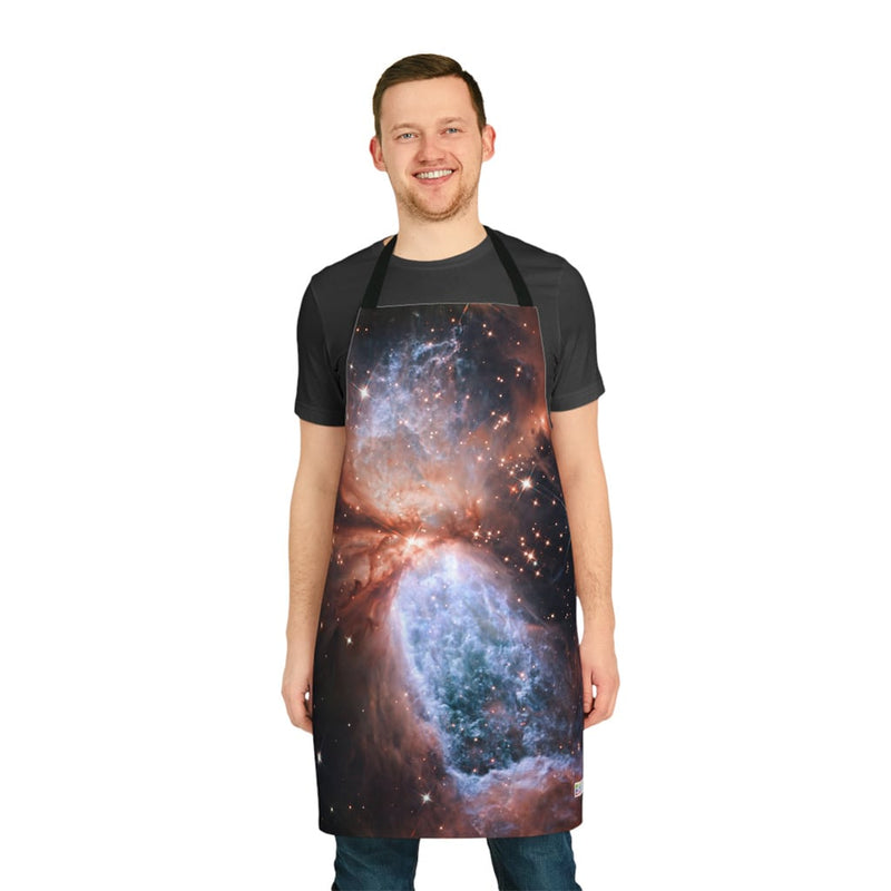 A man wearing a Chef's Vision Cosmos Apron in the kitchen.