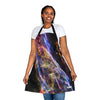 A woman wearing a colorful Cosmos Apron by Chef's Vision, confidently working in her kitchen.