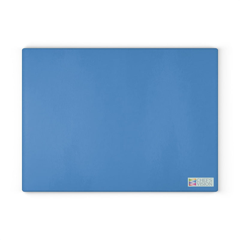 A blue SliceBright Color Glass Cutting Board by Chef's Vision for precision cutting on a white background.