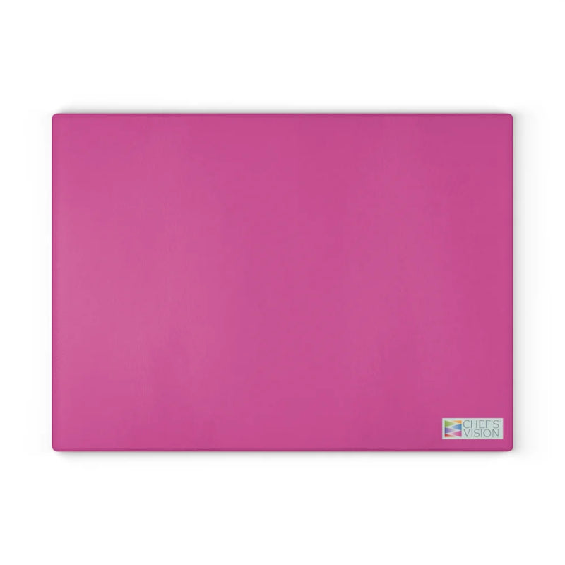 The Chef’s Vision SliceBright Color Glass Cutting Board features a rectangular, solid pink design with a small logo in the lower right, adding bold style to your kitchen—perfect for those who love colorful tempered glass boards.