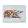 A SliceBright Wildlife Glass Cutting Board, branded by Chef's Vision, depicts a tiger lounging amidst the snowy landscape.