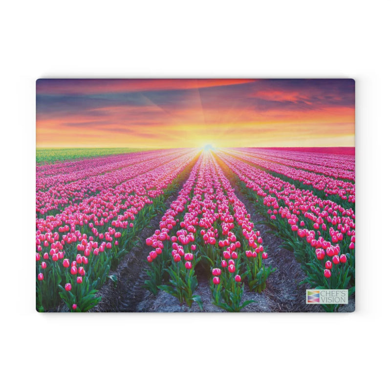 Chef's Vision SliceBright Landscape Glass Cutting Board features scenic pink tulips beneath a vibrant sunset, bringing striking floral beauty to your kitchen counter.