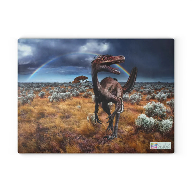 A feathered dinosaur roams a grassy prehistoric scene under a vibrant rainbow in this stunning artwork, featured on the Chef's Vision SliceBright Jurassic Glass Cutting Board—a unique piece for your kitchen counter.