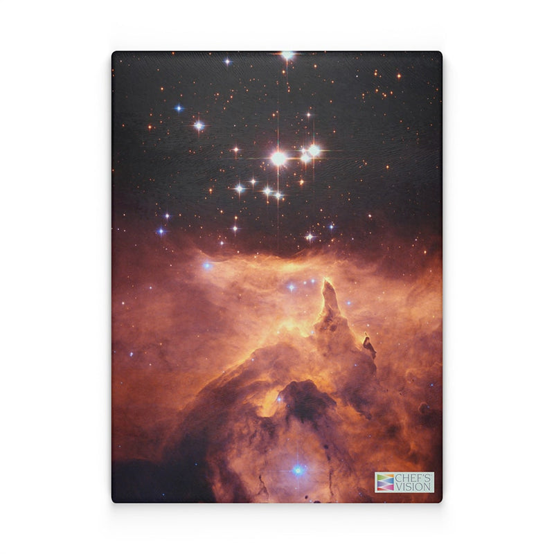 A mesmerizing SliceBright Cosmos Glass Cutting Board featuring an image of the eagle nebula on a canvas, from Chef's Vision.