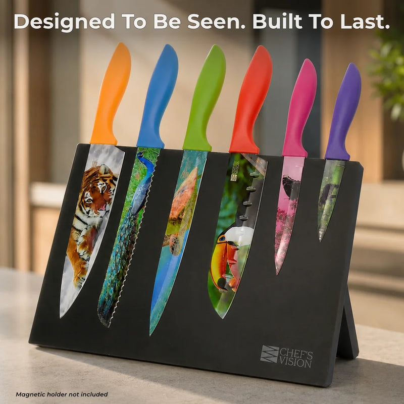 The Chef's Vision Wildlife Six-Piece Knife Set features six animal-themed stainless steel blades with ergonomic handles, displayed in a black angled holder on a kitchen counter.