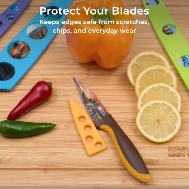 Chef's Vision BladeKeepers Blade Covers for the Jurassic Series Knife Set are shown on a cutting board beside sliced lemon and peppers, with text that reads “Protect Your Blades.”.