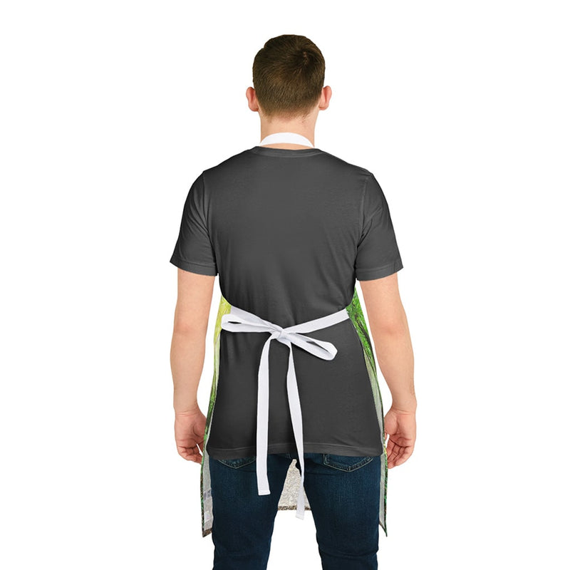 The back view of a man wearing a Chef's Vision Landscape Apron.