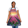 A woman wearing a Chef's Vision Aprons with an image of tulips.