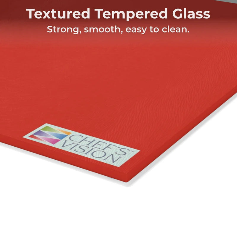 A close-up of the SliceBright Color Glass Cutting Board by Chef's Vision shows its bold red textured surface, logo in the corner, and text highlighting its strong, smooth, easy-to-clean design—ideal for any kitchen counter.