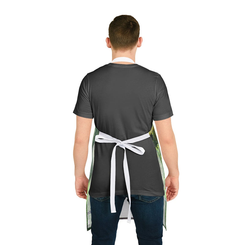The back of a man wearing a Chef's Vision Wildlife Apron.