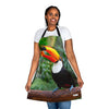 A woman wearing a Chef's Vision Wildlife Apron with a toucan on it.