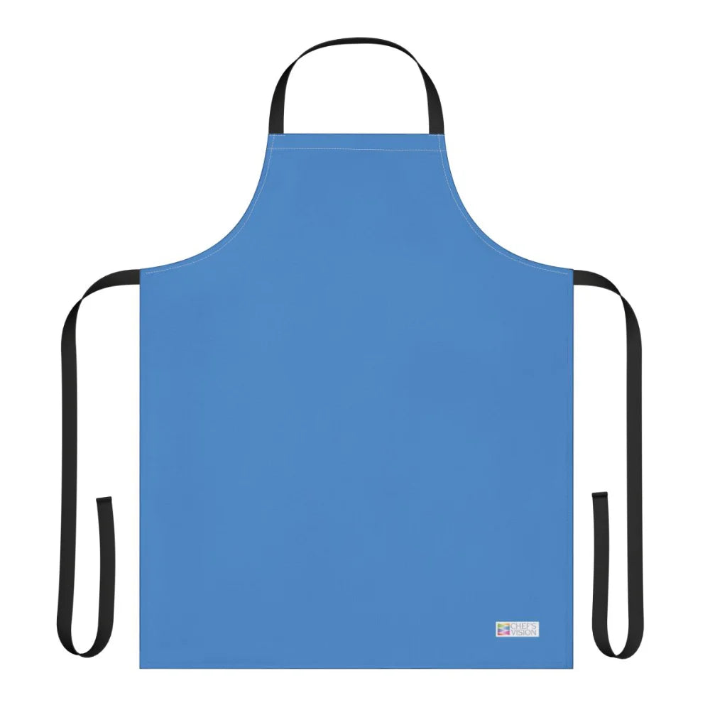The Chef's Vision Color Apron in plain blue features black neck and waist straps, a small white label at the bottom right, and is displayed on a white background—making it a stylish choice for kitchens or as a thoughtful chef gift.