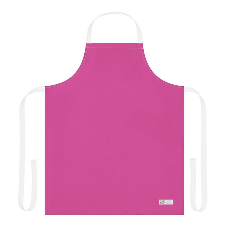 The Chef's Vision Color Apron, featuring a plain pink design with white neck and waist straps, is displayed against a white background—a perfect gift for chefs.