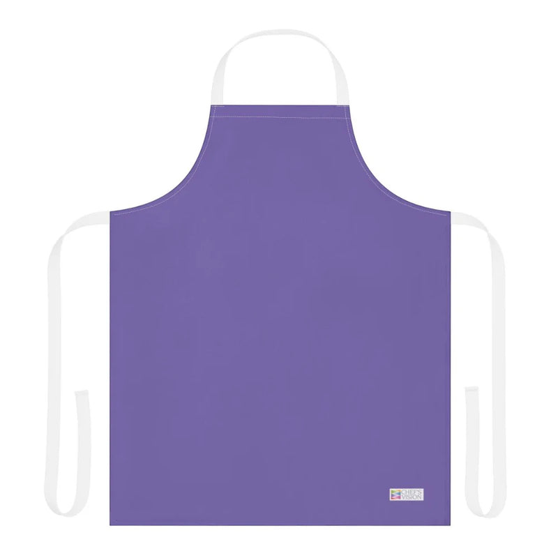 The Chef's Vision Color Apron in purple, featuring white neck and waist ties and a small label at the bottom right, is laid flat on a white background—an ideal gift for chefs or home cooks.