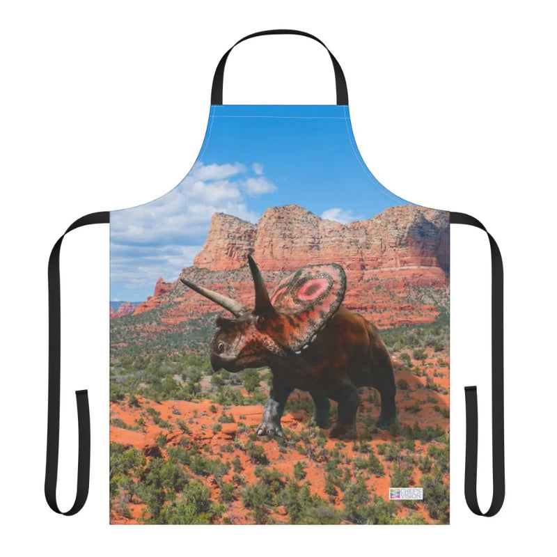 The Chef's Vision Jurassic Apron features a triceratops illustration over a red rock desert background, making it a unique gift for any dinosaur enthusiast.