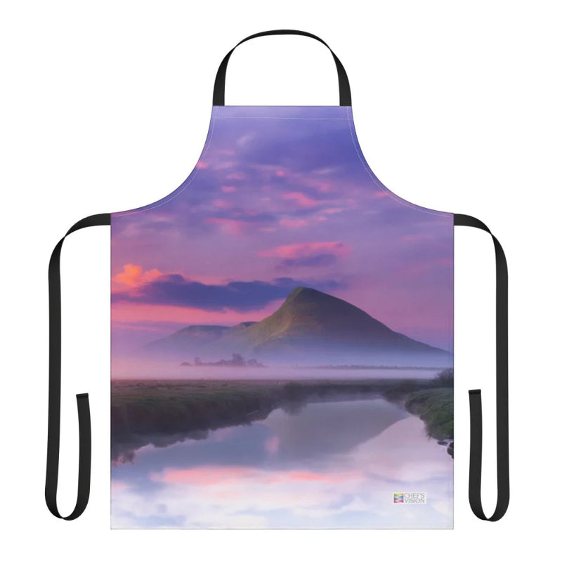 The Chef's Vision Landscape Apron features nature-inspired art of a mountain sunrise or sunset reflected in a river, printed on durable polyester canvas.