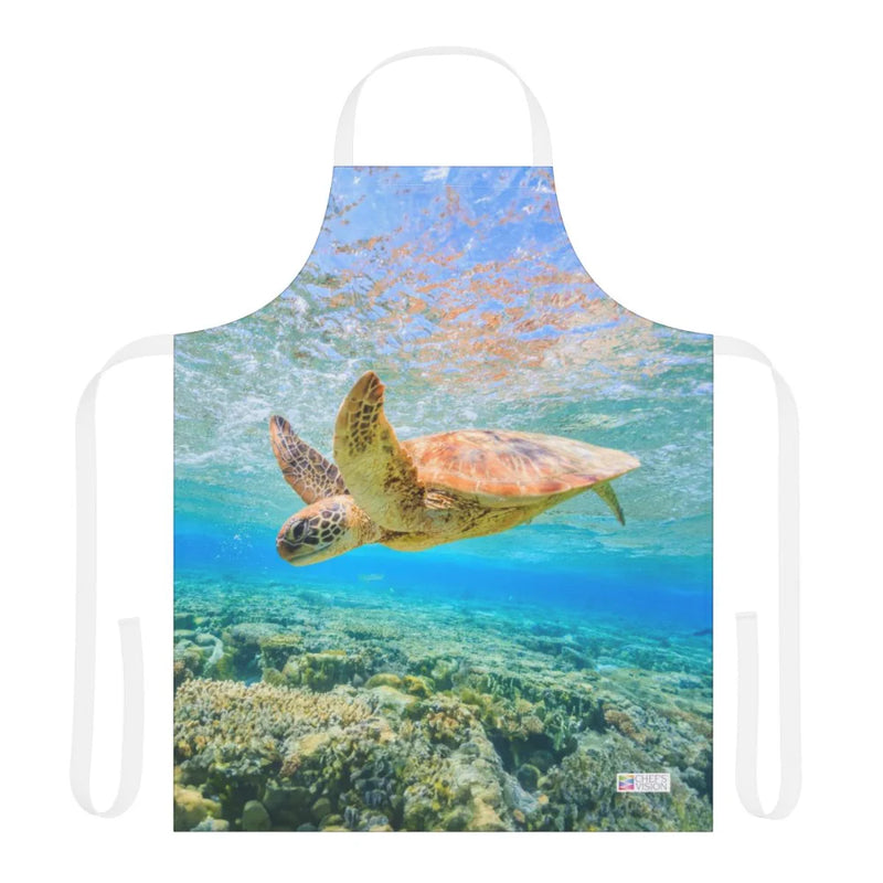 The Chef's Vision Wildlife Apron features a sea turtle swimming above a coral reef in clear blue water under sunlight, printed on durable polyester canvas.