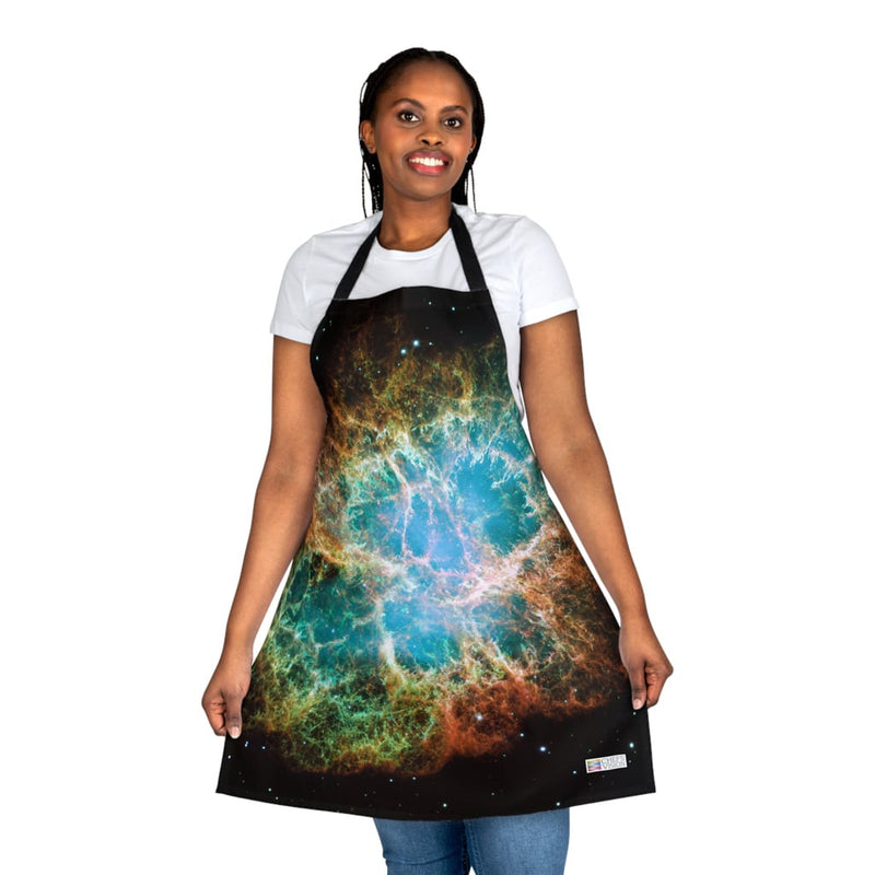 A woman wearing a Chef's Vision apron with an image of the nebula nebula.
