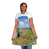 A woman showcasing her artistic Chef's Vision Masterpiece Apron.