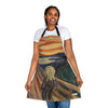 A woman donning a Chef's Vision Masterpiece Apron adorned with a masterpiece of the scream.